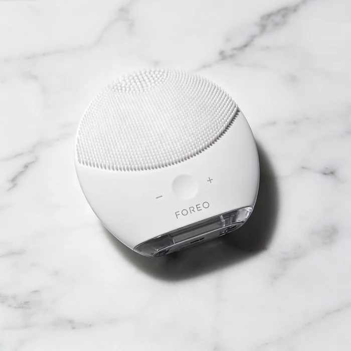 a Foreo Luna 3 device on a white marble surface