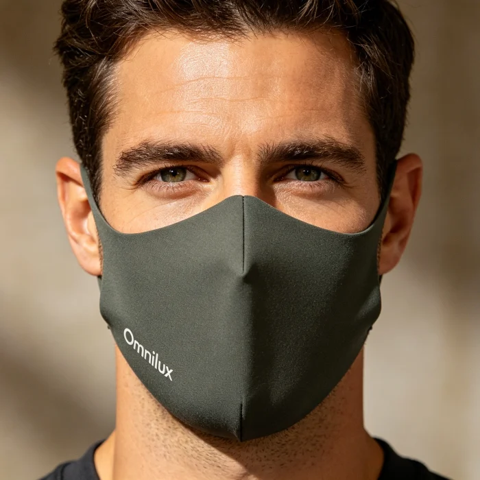 a person wearing the Omnilux Men's Face Mask