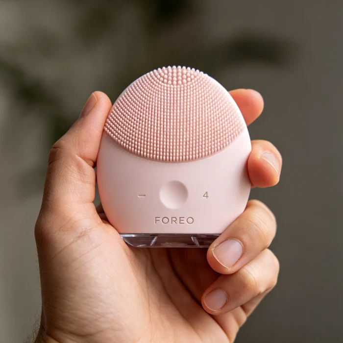 FOREO Luna 4 silicone face brush in hand